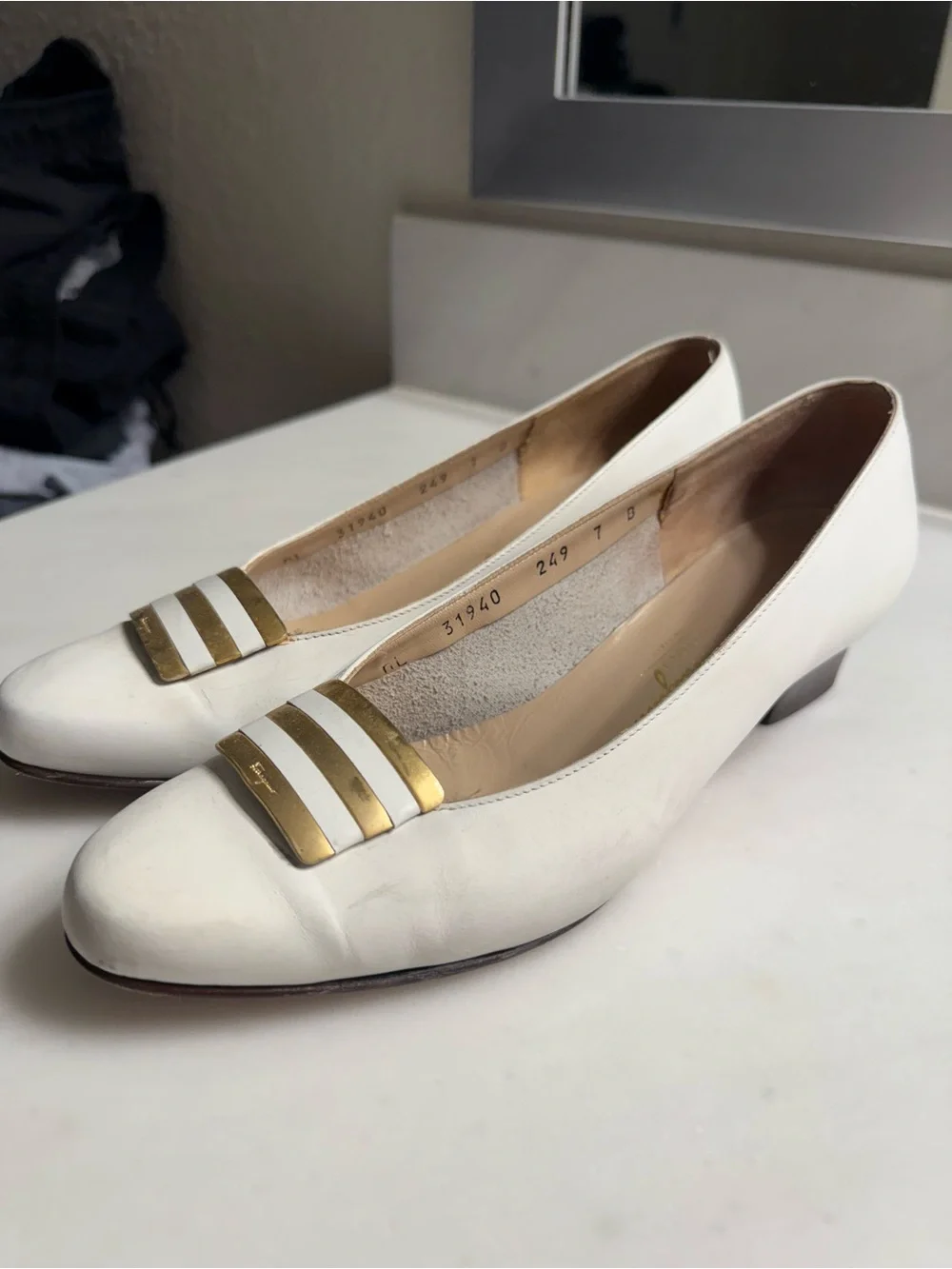 Salvatore Ferragamo White Leather Flats with Gold Striped Accent